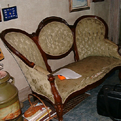 Heritage triple-back sofa during the reconstruction process in the workroom